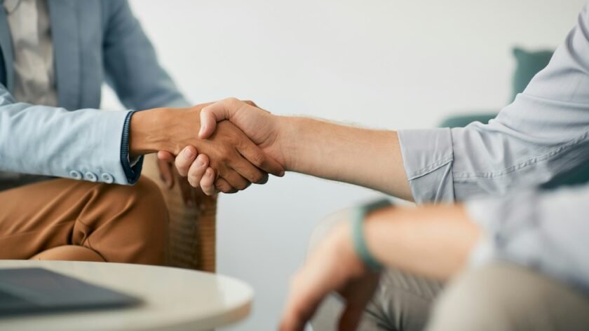 Hand Shake Male and Female Engineers