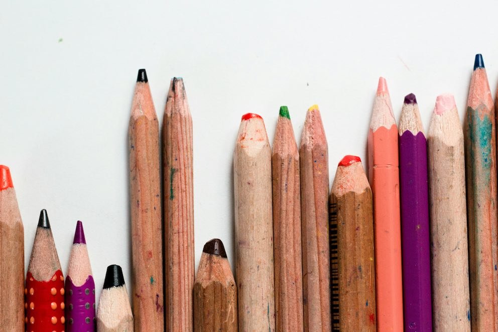 Code Without Borders: Cultural Differences in Tech Workspaces 4 Diversity Colored Pens